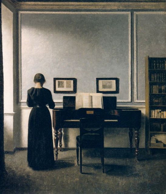 interior-with-piano-and-woman-in-black-strandgade-30